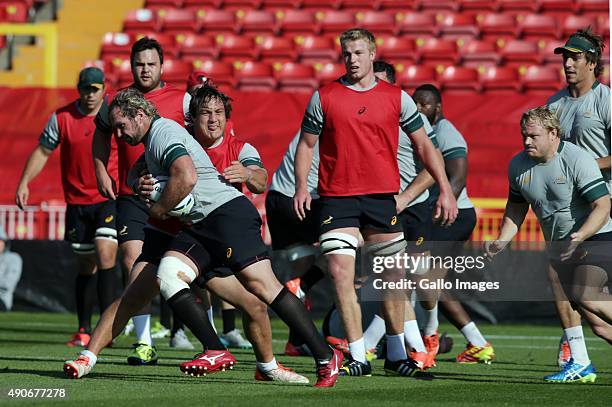 Jannie du Plessis tackled by Coenie Oosthuizen during the South African national rugby training session at Gateshead International Stadium on...