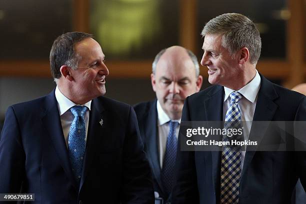 Prime Minister John Key and Finance Minister Bill English walk to the house for the 2014 budget presentation at Parliament on May 15, 2014 in...