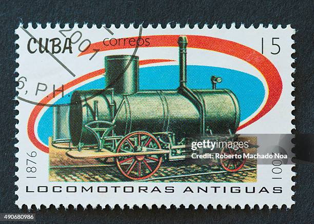 Cuban 2001 stamp from the 'Antique Locomotives' series depicting a rail steam engine of 1876.