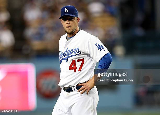 Starting pitcher Paul Maholm of the Los Angeles Dodgers reacts during the Miami Marlins six run second inning at Dodger Stadium on May 14, 2014 in...