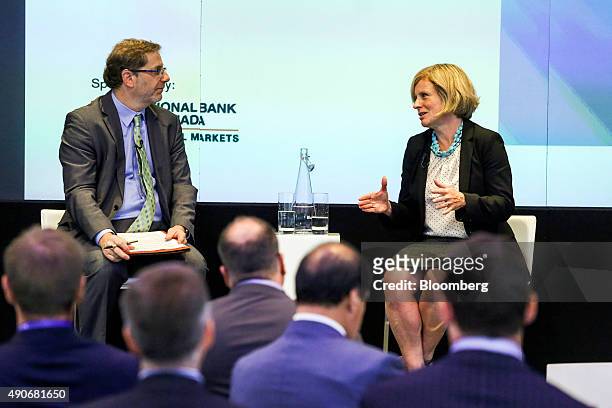 Rachel Notley, Alberta's premier, right, speaks during an interview at the Canadian Fixed Income Conference in New York, U.S., on Wednesday, Sept....