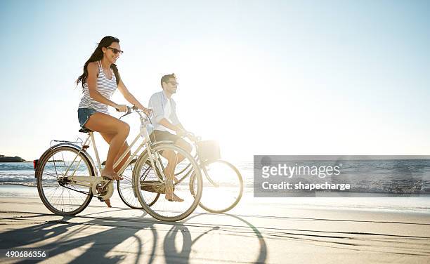 taking a ride in the sun - cycling stock pictures, royalty-free photos & images