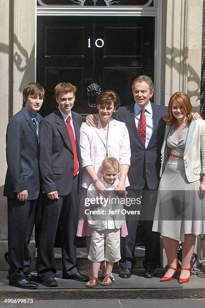 Tony Blair with his family on the doorstep of 10 Ten Downing Street. L-R, sons, Nicky , Euan, wife Cherie, son Leo, Tony Blair and daughter Kathryn....