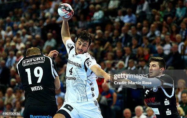 Domagoj Duvnjak of Kiel challenges for the ball with Max Weiss of Bergischer HC during the DKB HBL Bundesliga match between THW Kiel and Bergischer...