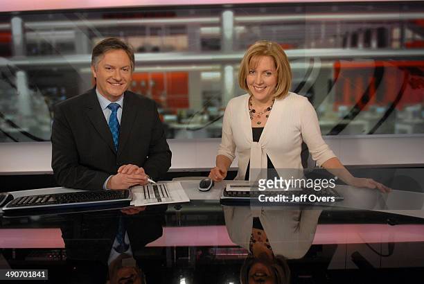 Portrait of BBC News presenters and broadcasters Simon McCoy and Carrie Gracie, .