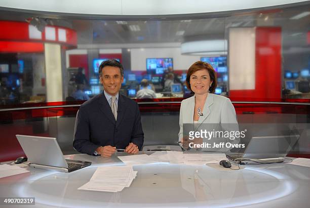 Matthew Amroliwala and Jane Hill on the set of BBC rolling news programme, News 24.