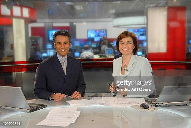 Matthew Amroliwala and Jane Hill on the set of BBC rolling news programme, News 24.