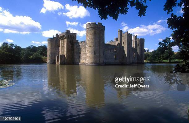 Bodiam Castle, East Sussex, and its surrounding moat / lake. June 2000. Reflection reflections.