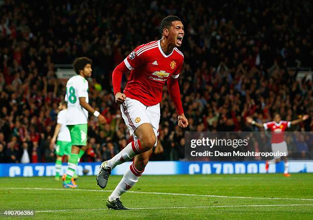 Chris Smalling of Manchester United celebrates as he scores their second goal during the UEFA Champions League Group B match between Manchester...
