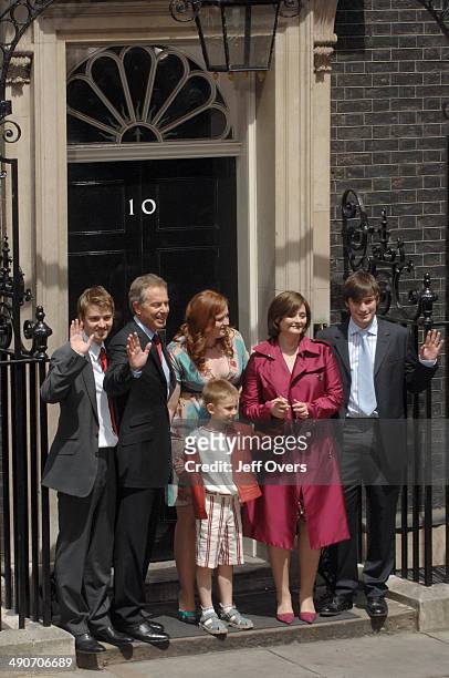 Tony Blair and his family wave to the press just before their final departure from 10 Downing Street, on the day that he steps down as Prime Minister...
