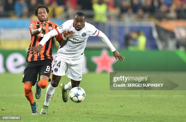 Shakhtar Donetsk's Brazilian midfielder Fred vies with Paris Saint-Germain's French midfielder Blaise Matuidi during the UEFA Champions League group...