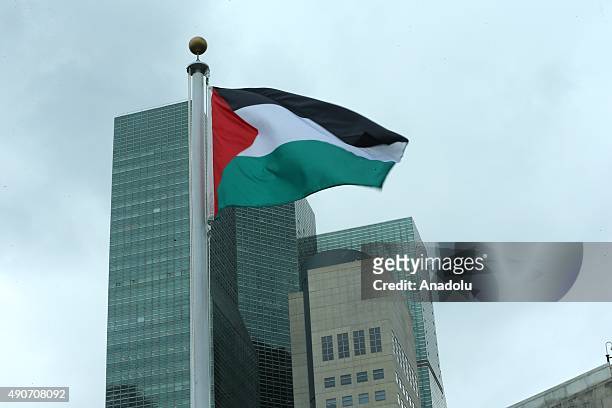 The Palestinian flag flies for the first time at the United Nations headquarters after a flag-raising ceremony in the Rose Garden on September 30,...