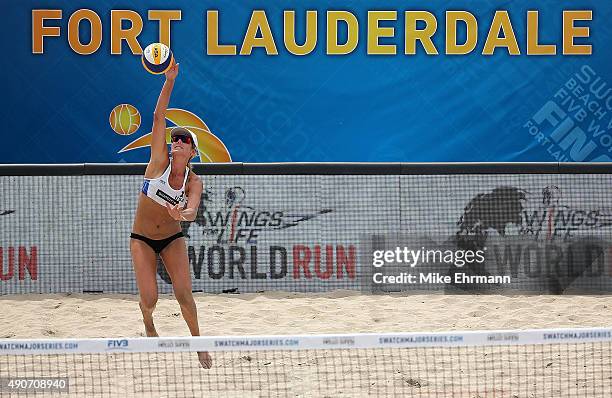 Jennifer Kessy of the United States plays a shot during a match against Sarah Pavan and Heather Bansley of Canada during the 2015 Swatch FIVB World...