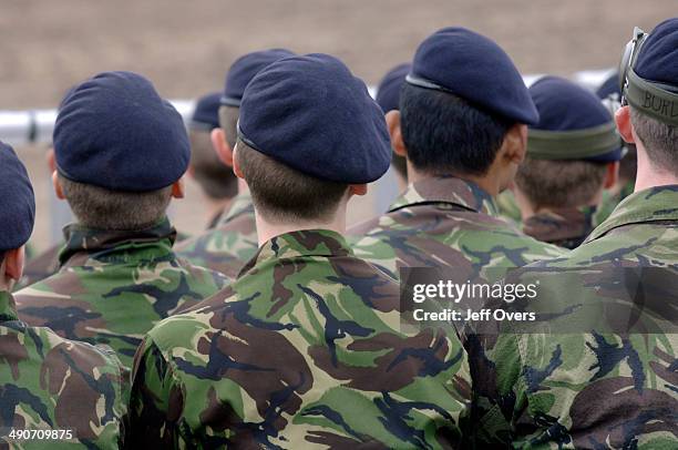 Officer cadets from the British Army take part in a training exercise on Salisbury Plain, Wiltshire, . Troops cadet officers camouflage.