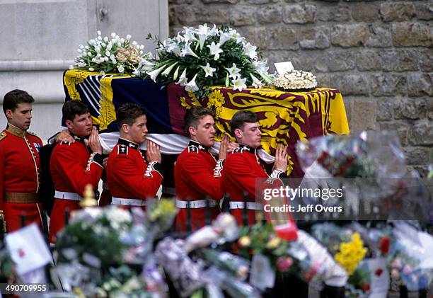 Guardsmen bearing the coffin of Diana, Princess of Wales, from Westminster Abbey at her funeral in London on .