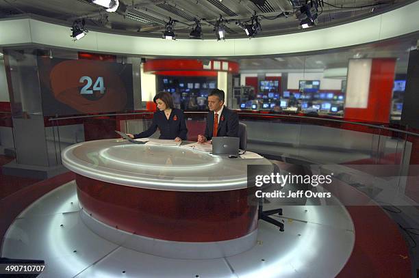 Jane Hill and Chris Eakin on the BBC News 24 studio set.