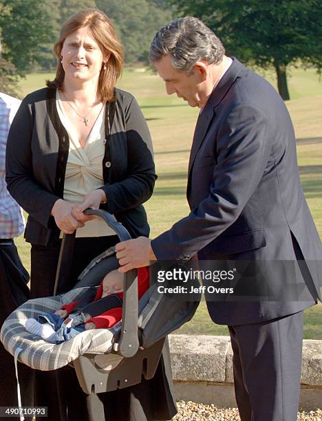 Chancellor of the Exchequer Gordon Brown with his wife Sarah and their two-month old baby boy James Fraser Brown, in Edinburgh, .