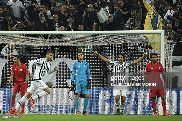 Sevilla's goalkeeper Sergio Rico Gonzalez reacts after Juventus' forward from Spain Alvaro Morata scored during the UEFA Champions League football...