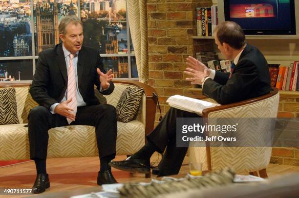 Prime minister Tony Blair gestures as he is interviewed by host Andrew Marr on the BBC current affairs programme, Sunday AM