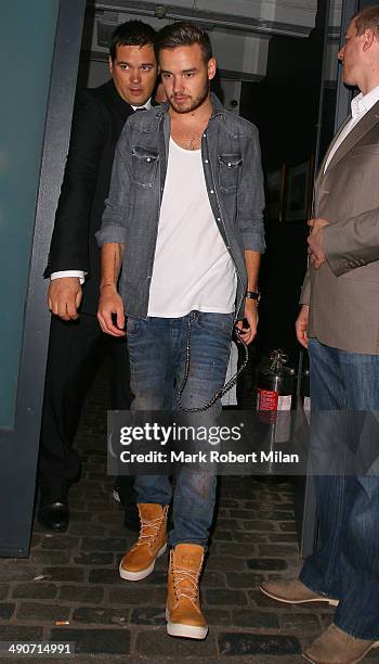 Liam Payne attending a photocall to launch the David Beckham for H&M Swimwear collection on May 14, 2014 in London, England.