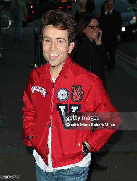 Nick Grimshaw attending a photocall to launch the David Beckham for H&M Swimwear collection on May 14, 2014 in London, England.