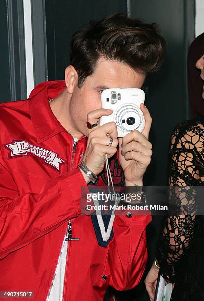 Nick Grimshaw attending a photocall to launch the David Beckham for H&M Swimwear collection on May 14, 2014 in London, England.