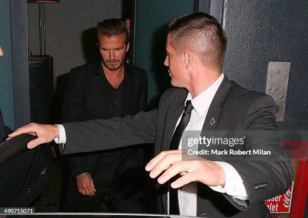 David Beckham attending a photocall to launch the David Beckham for H&M Swimwear collection on May 14, 2014 in London, England.