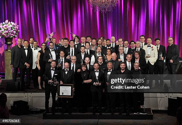 The 2014 BMI Film/TV Award winners gather for a photo following the 2014 BMI Film/TV Awards at the Beverly Wilshire Four Seasons Hotel on May 14,...