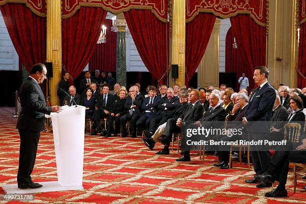 French President Francois Hollande gives to Director of sponsorship LVMH, Jean-Paul Claverie, Insignia of Officer of the Legion of Honor at Elysee...