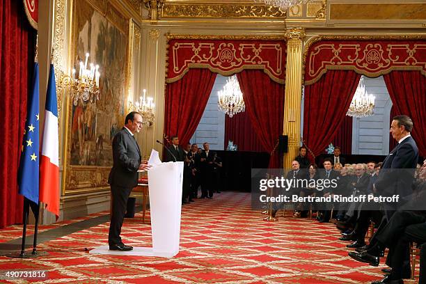 French President Francois Hollande gives to Director of sponsorship LVMH, Jean-Paul Claverie, Insignia of Officer of the Legion of Honor at Elysee...