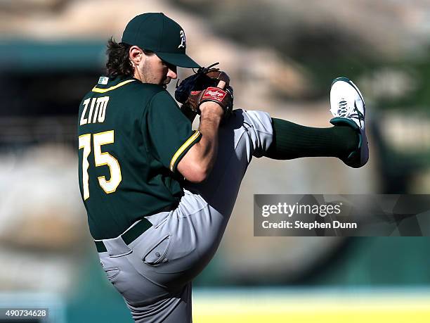 Barry Zito of the Oakland Athletics throws a pitch against the Los Angeles Angels of Anaheim at Angel Stadium of Anaheim on September 30, 2015 in...