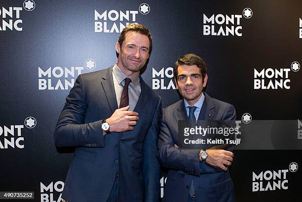 Hugh Jackman and Montblanc CEO Jerome Lambert attend the Montblanc press conference during the Watches and Wonders 2015 Exhibition in Hong Kong...