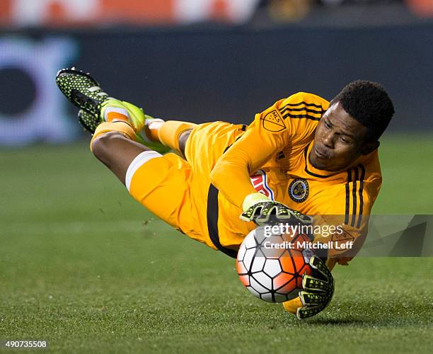 Andre Blake of the Philadelphia Union makes a diving save in the first half of the 2015 U.S. Open Cup Final against Sporting Kansas City on September...