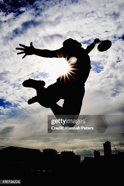 New Zealand Ultimate Frisbee player Zev Fishman dives for a frisbee during a photoshoot on October 1, 2015 in Auckland, New Zealand. The...