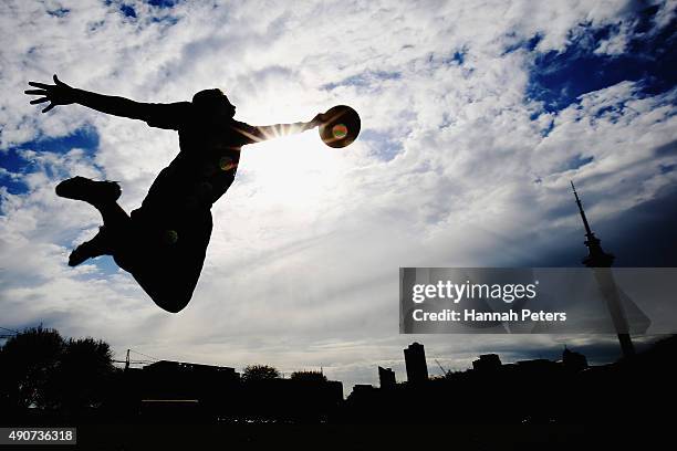 New Zealand Ultimate Frisbee player Zev Fishman dives for a frisbee during a photoshoot on October 1, 2015 in Auckland, New Zealand. The...