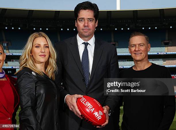 Singers Bryan Adams and Ellie Goulding pose with AFL Chief Executive Officer, Gillon McLachlan during a 2015 AFL Grand Final Entertainment Media...