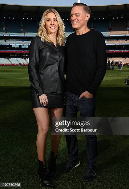 Singers Bryan Adams and Ellie Goulding pose during a 2015 AFL Grand Final Entertainment Media Opportunity at the Melbourne Cricket Ground on October...