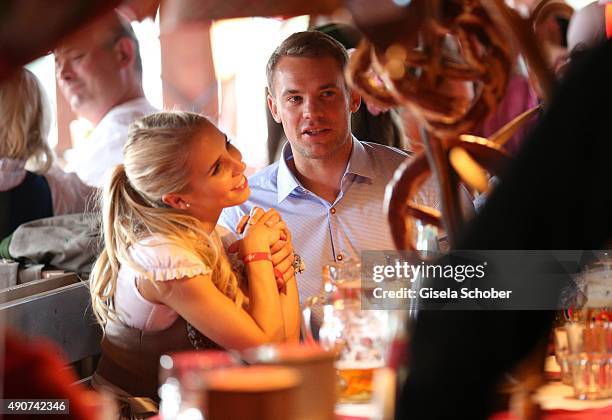 Manuel Neuer and Nina Weiss attend the 'FC Bayern Muenchen Wiesn' during Oktoberfest 2015 at Kaeferschaenke on September 30, 2015 in Munich, Germany.