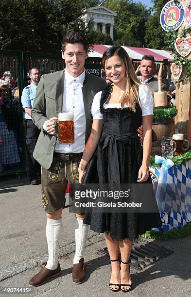 Robert Lewandowski and his partner Anna Stachurska attend the 'FC Bayern Muenchen Wiesn' during Oktoberfest 2015 at Kaeferschaenke on September 30,...
