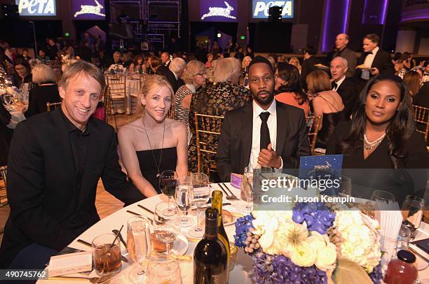 Pro skateboarder Tony Hawk, Cathy Goodman, recording artist RZA and Talani Rabb attend PETA's 35th Anniversary Party at Hollywood Palladium on...