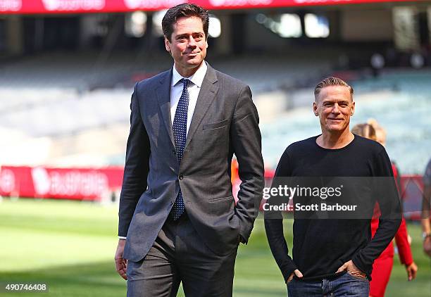 Singer Bryan Adams and AFL Chief Executive Officer, Gillon McLachlan look on during a 2015 AFL Grand Final Entertainment Media Opportunity at the...