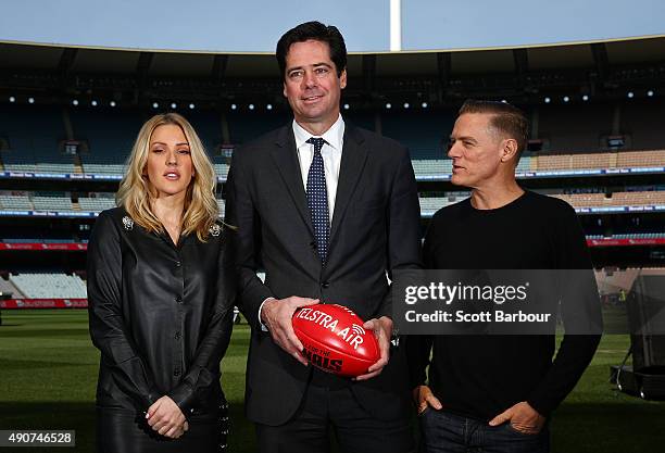 Singers Bryan Adams and Ellie Goulding pose with AFL Chief Executive Officer, Gillon McLachlan during a 2015 AFL Grand Final Entertainment Media...