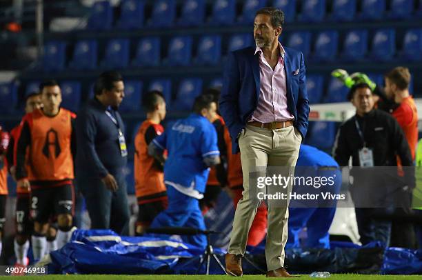 Gustavo Matosas coach of Atlas walks on the sideline during the 11th round match between Cruz Azul and Atlas as part of the Apertura 2015 Liga MX at...