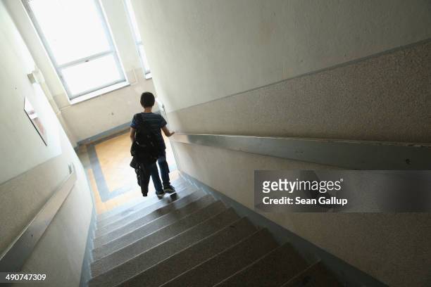 6th grade pupil walks down a stairwell at the Middle School on May 14, 2014 in Seifhennersdorf, Germany. The state of Saxony officially closed the...