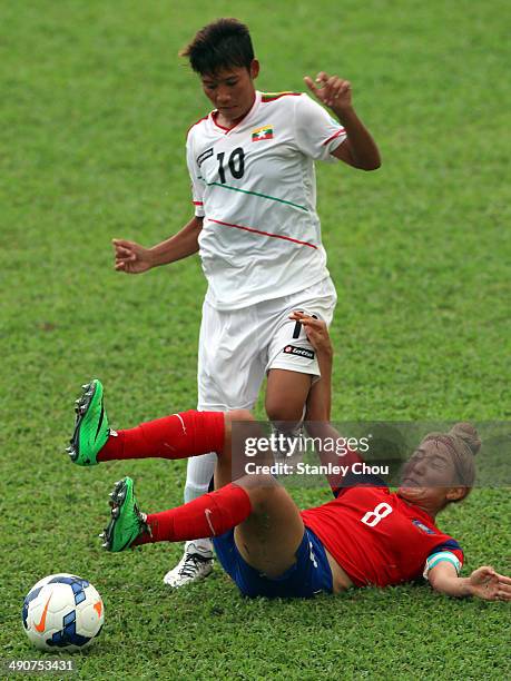Cho So Hyun of Korea Republic clashes with Khin Marlar Tun of Myanmar during the AFC Women's Asian Cup Group B match between Korea Republic and...