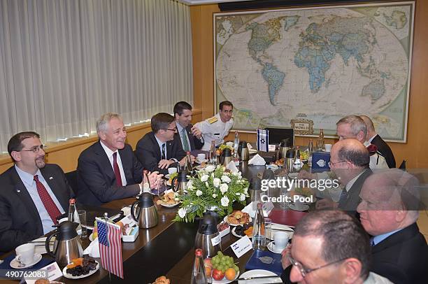 Israeli Defense Minister Moshe Ya'alon and US Defense Secretary Chuck Hagel start their meeting at The Kirya, the Israeli Defense Force headquarters,...