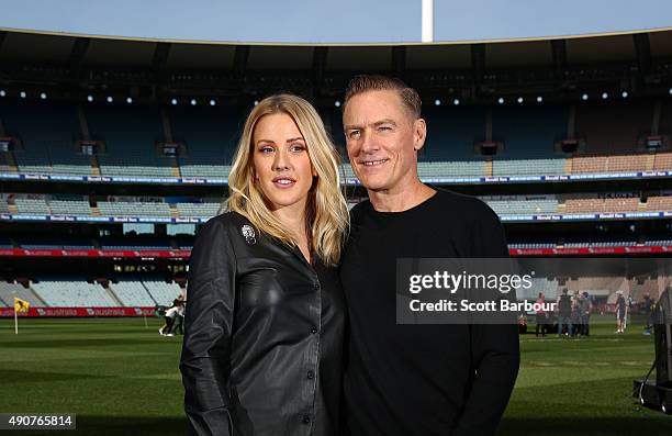 Singers Bryan Adams and Ellie Goulding pose during a 2015 AFL Grand Final Entertainment Media Opportunity at the Melbourne Cricket Ground on October...