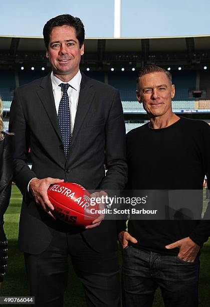 Singer Bryan Adams poses with AFL Chief Executive Officer, Gillon McLachlan during a 2015 AFL Grand Final Entertainment Media Opportunity at the...