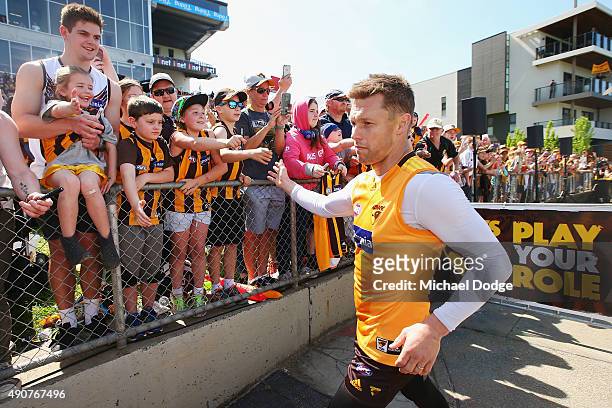 Sam Mitchell of the Hawks is greeted by fans when walking off during a Hawthorn Hawks AFL training session at Waverley Park on October 1, 2015 in...