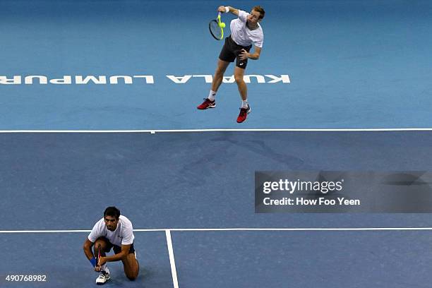 Rameez Junaid of Australia and Jonathan Marray of Germany competes against Raven Klaasen of RSA and Rajeev Ram of USA during the 2015 ATP Malaysian...